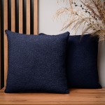 Dekoracyjna poszewka na poduszkę 45x45 cm w kolorze granatowym z tkaniny szenilowej z teksturą
