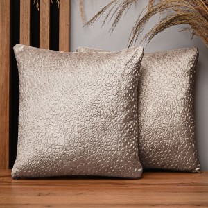 Dekoracyjna poszewka na poduszkę 35x35 cm w kolorze beżowym z tkaniny welurowej z teksturą “kropelki”