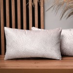 Dekoracyjna poszewka na poduszkę 30x50 cm w kolorze pudrowego różu z tkaniny welurowej z teksturą “kropelki”